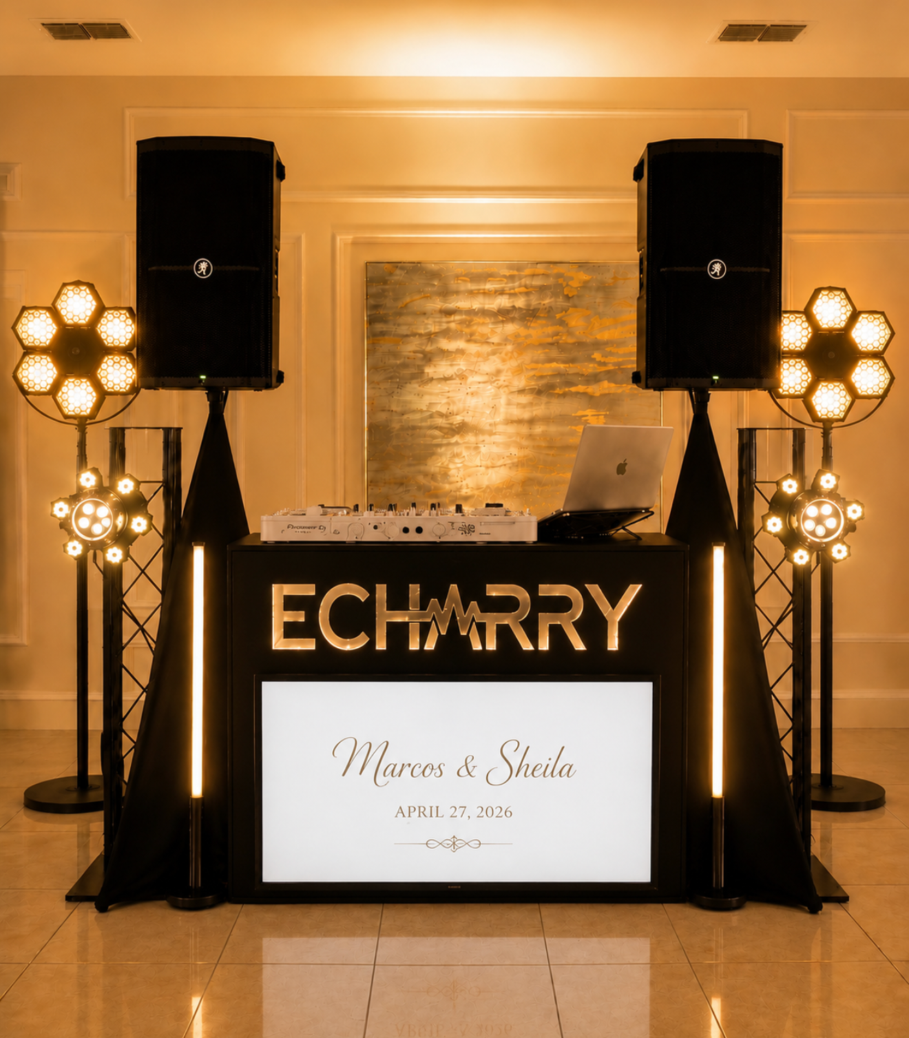 DJ Echarry luxury booth with premium sound and warm event lighting