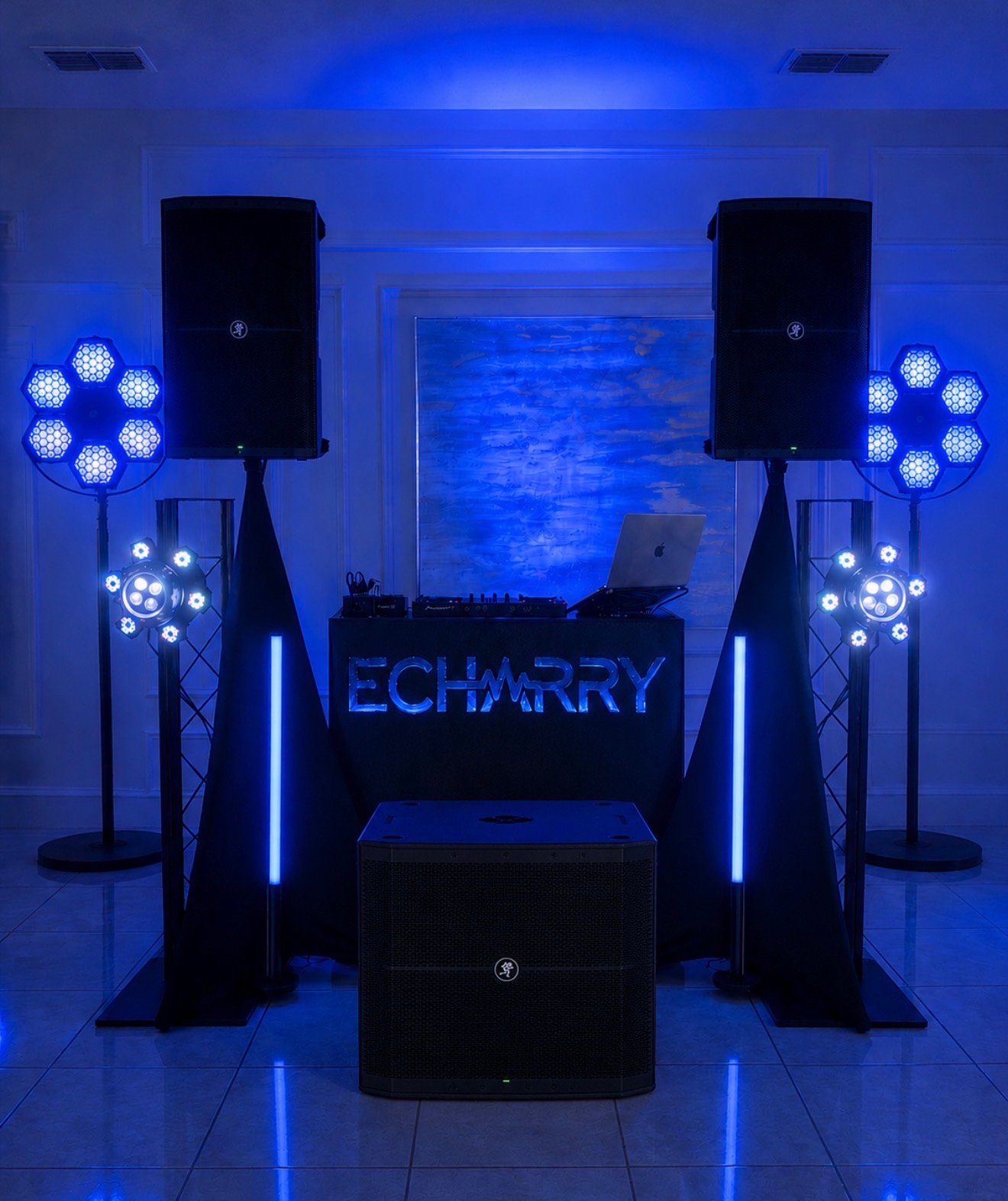 DJ Echarry premium sound and lighting setup illuminated in blue